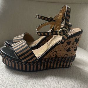 Beautiful wedge shoes! Worn once. Great condition.